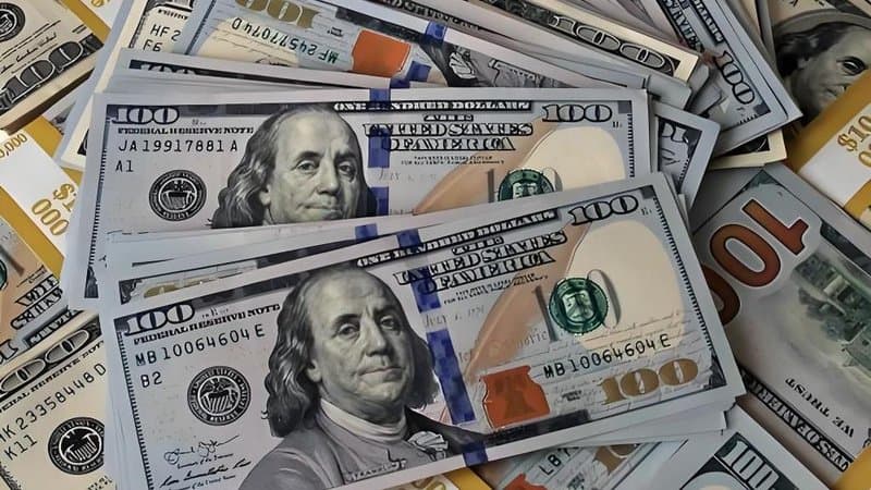 12.3 USD