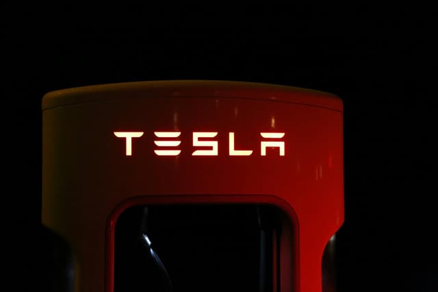 Wells Fargo downgrades Tesla to sell, citing price cuts don't ensure sales rise.