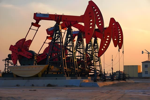 Oil dipped on rising inventories, with OPEC+ delay rumors offering support.